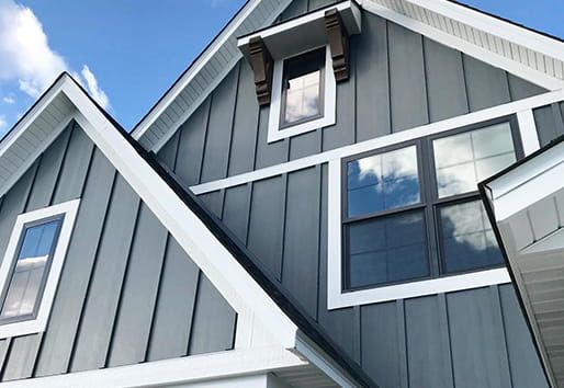 Pale Grayish Blue Exteriors With Balck Windows