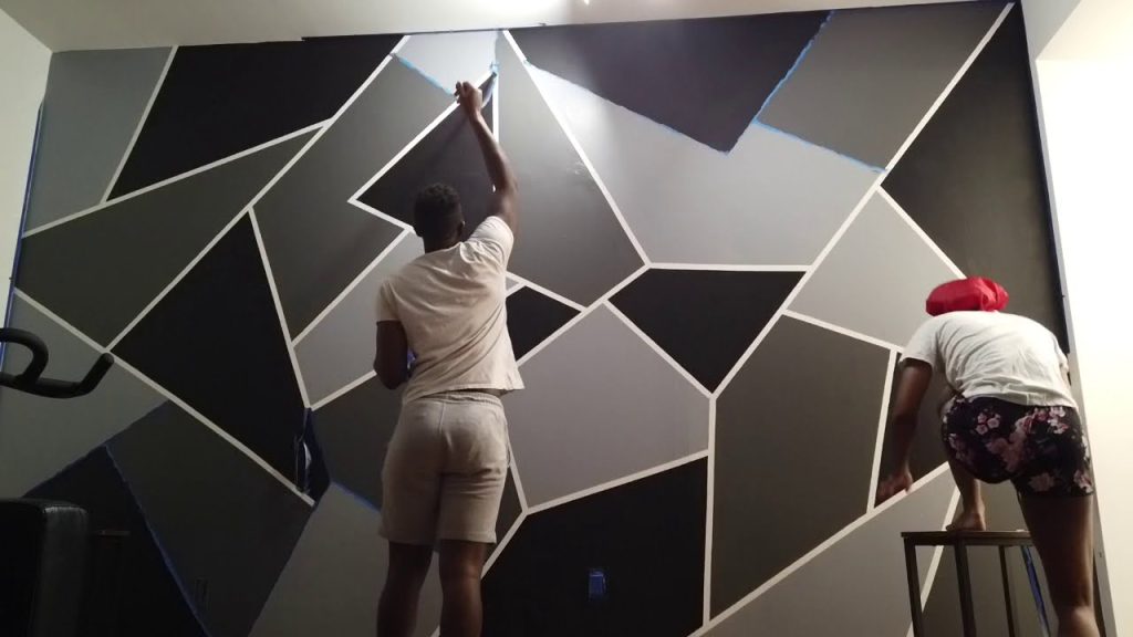 process of painting a geometric wall